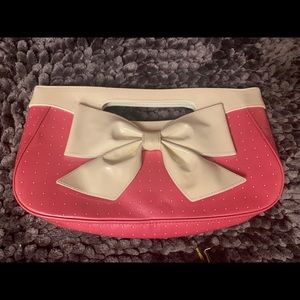 Isabella Fiore clutch with bow